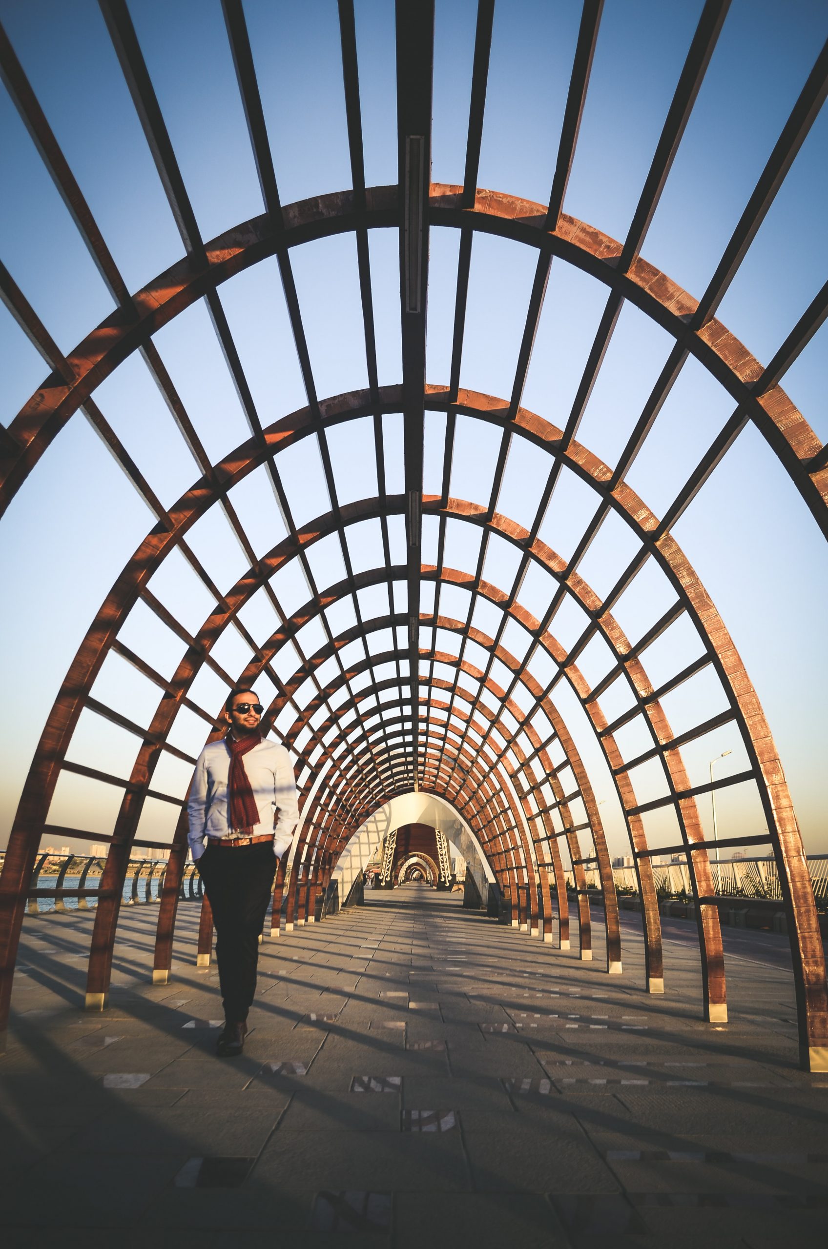 high achievers 2 person walking on bridge