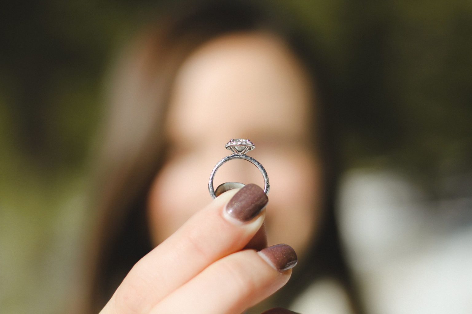 Woman Holding marriage Ring