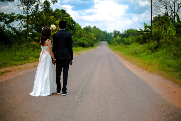 married couple on a road