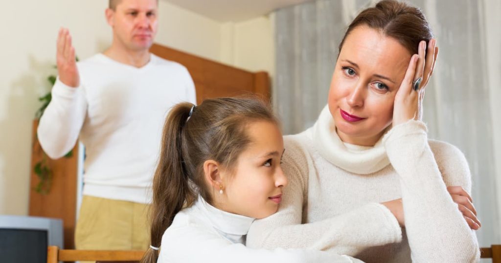 Couple arguing with child illustrating conflict from unspoken expectations